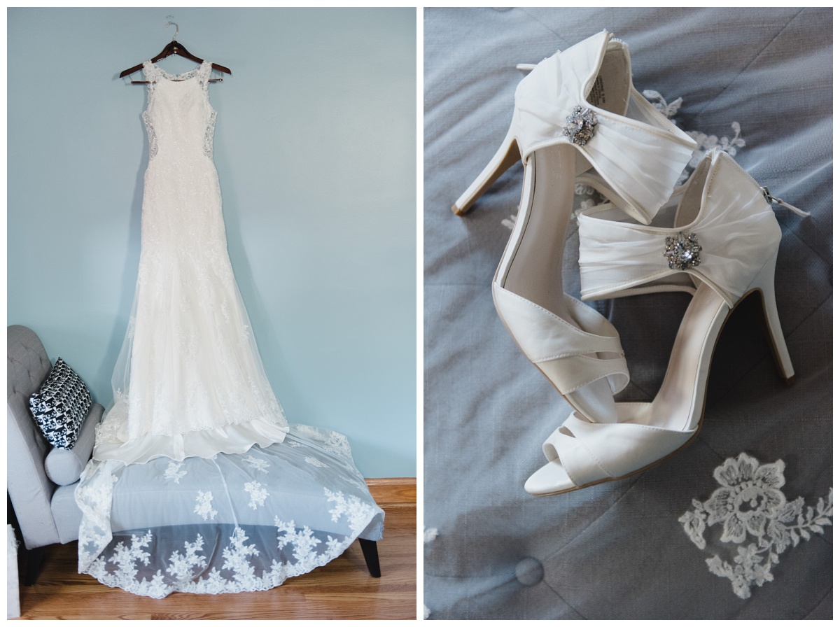 White lace dress hanging on a blue background, white satin shoes, wedding photography by Sandra Grunzinger